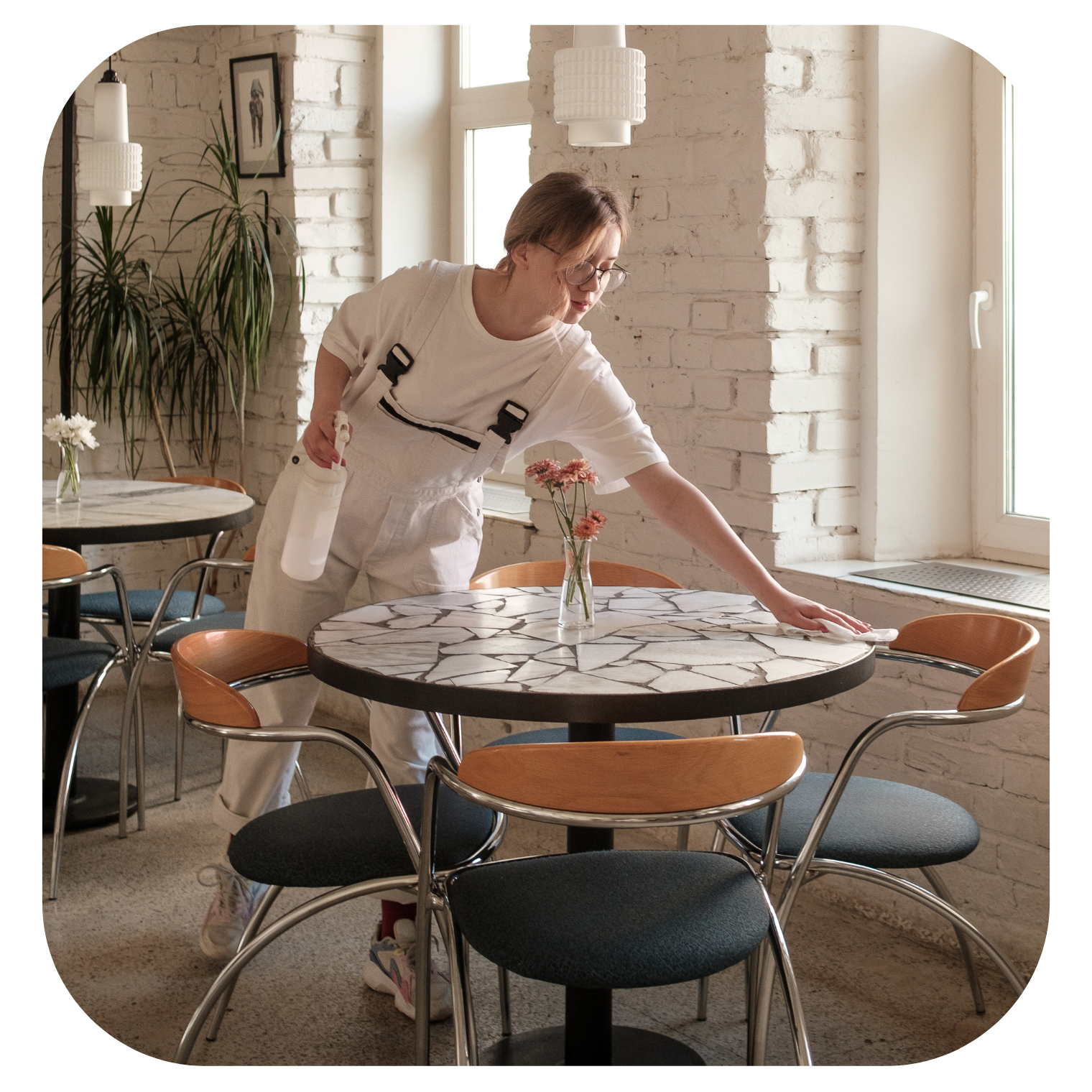 waitress cleaning a table